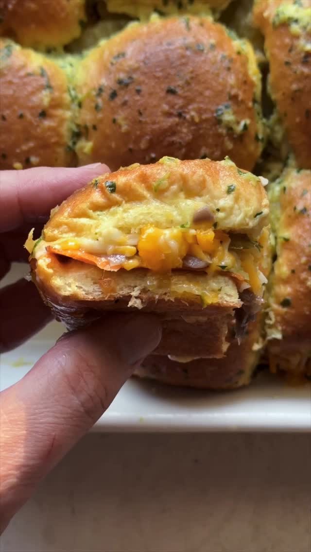 My vegan Cuban-style sliders are an homage to the classic and are inspired by the flavors but are not really an authentic Cuban sandwich. 

Savory vegan ham, melty plant-based cheese, tangy pickles, caramelized onions, and a buttery mustard topping baked until golden and irresistible. Perfect for game day, parties, or an easy comfort-food dinner.

👉 Comment “RECIPE” and I’ll send it over!